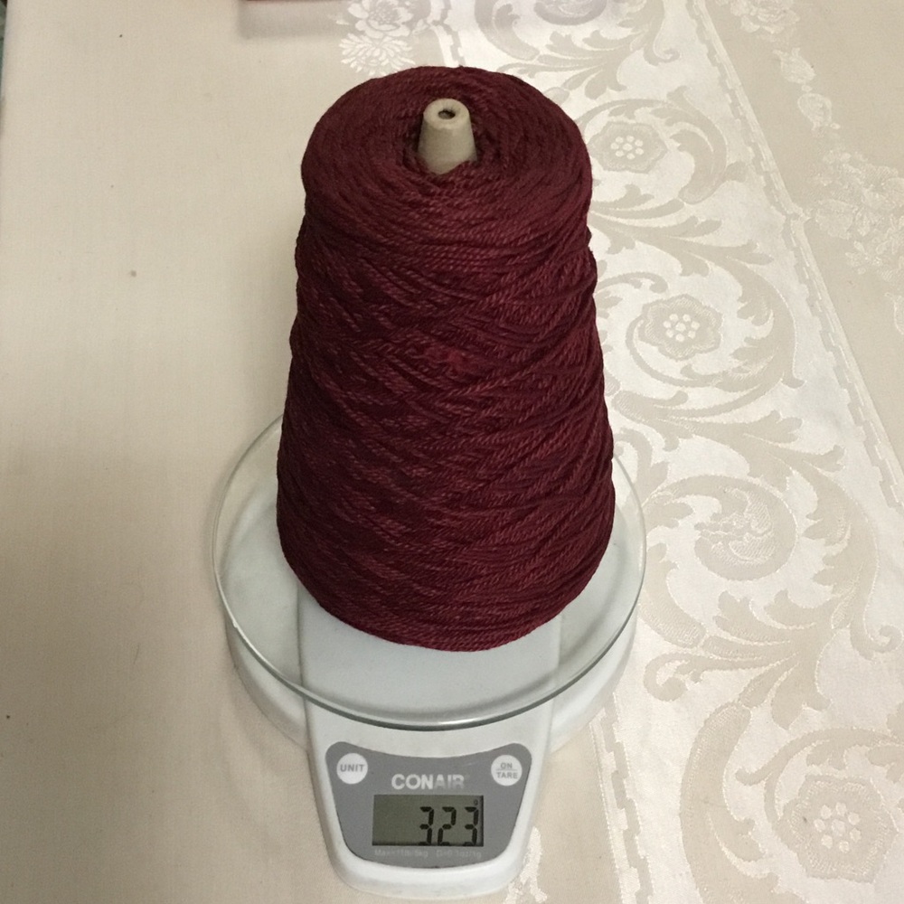 BIWA Cone and ball of Trade Winds from Crystal Palace Yarns.  Claret 9121